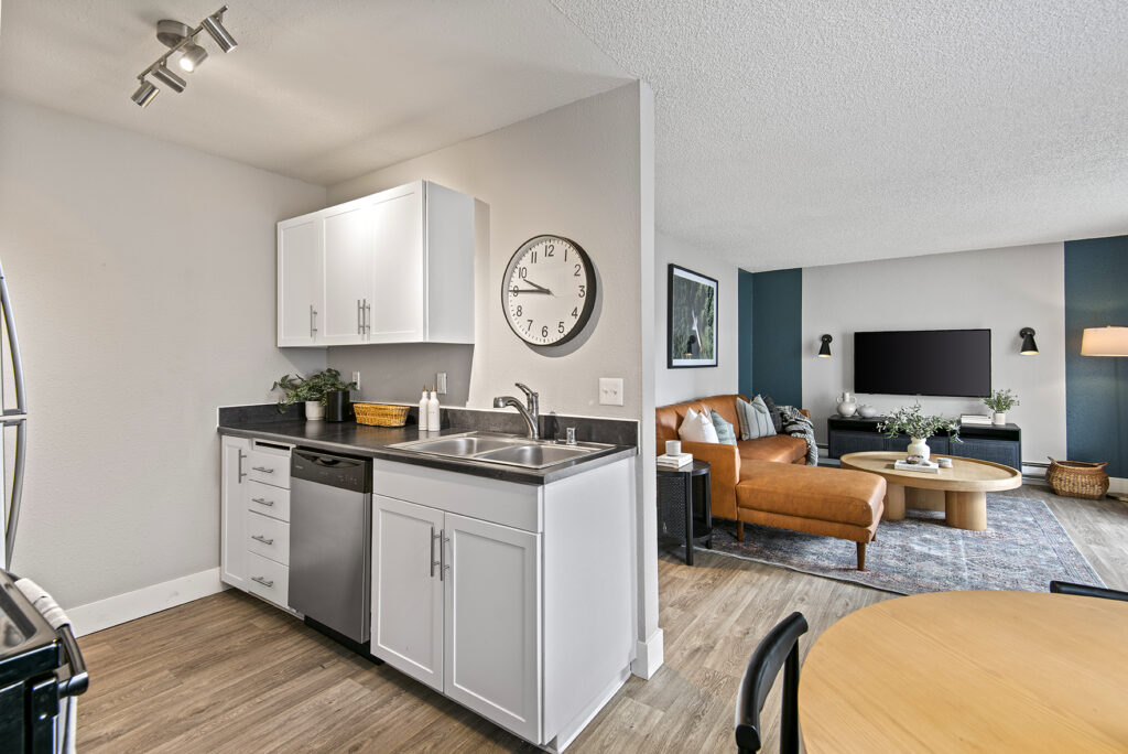 Open living kitchen, living and dining room space at Irwin Park apartments in Kent