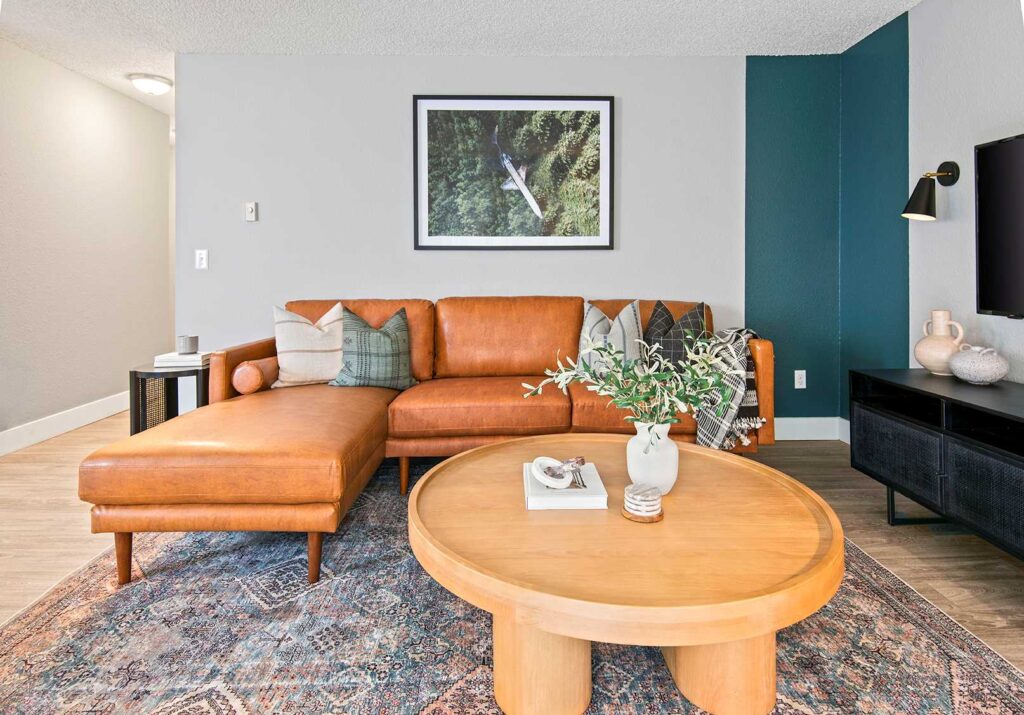 Living Room with teal blue accent color in the corner of the walls